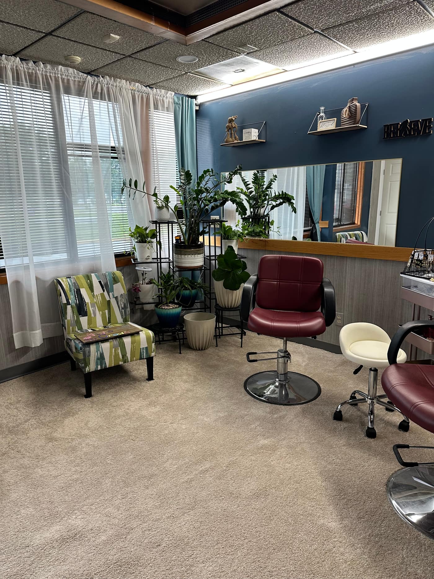 Nia's Crown Salon interior with natural light and plants